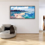 Beach Painting oil painting on canvas with rich impasto texture hanging in a modern living room with a beige sofa, viewed from a medium distance.