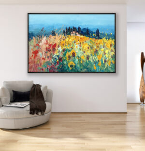 Landscape painting with sunflowers, original oil painting on canvas hanging in a modern living room with a beige sofa and home decor