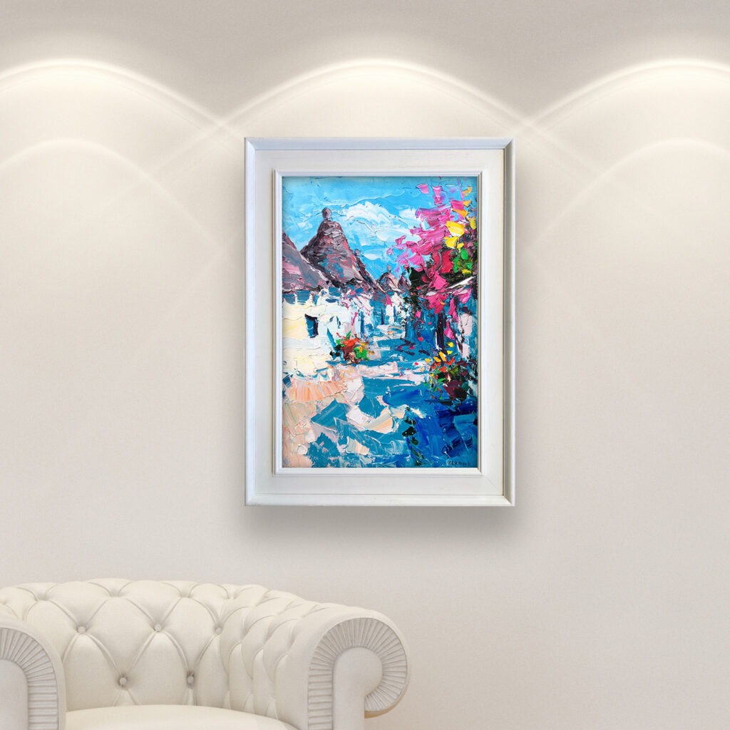 Trulli Alberobello oil painting on canvas with rich impasto texture hanging in a modern living room with a white sofa
