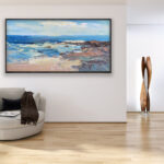 Beach painting, original oil painting on canvas hanging in a modern living room with a beige sofa