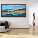 Abstract beach painting, original oil painting on canvas hanging in a modern living room with a beige sofa